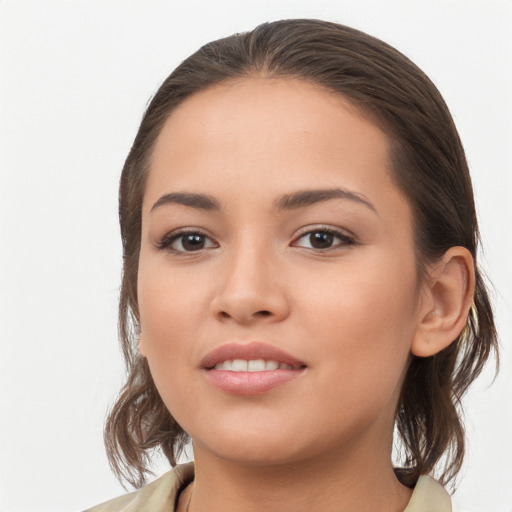 Joyful white young-adult female with medium  brown hair and brown eyes