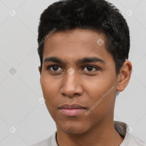 Neutral latino young-adult male with short  black hair and brown eyes