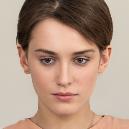 Neutral white young-adult female with short  brown hair and brown eyes