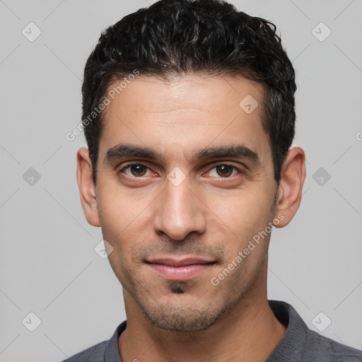 Joyful white young-adult male with short  black hair and brown eyes