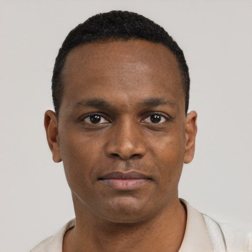 Neutral black young-adult male with short  black hair and brown eyes