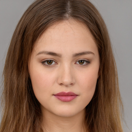 Neutral white young-adult female with long  brown hair and brown eyes