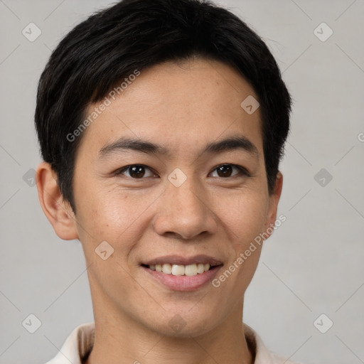 Joyful asian young-adult male with short  black hair and brown eyes