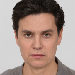 Neutral white adult male with short  brown hair and brown eyes