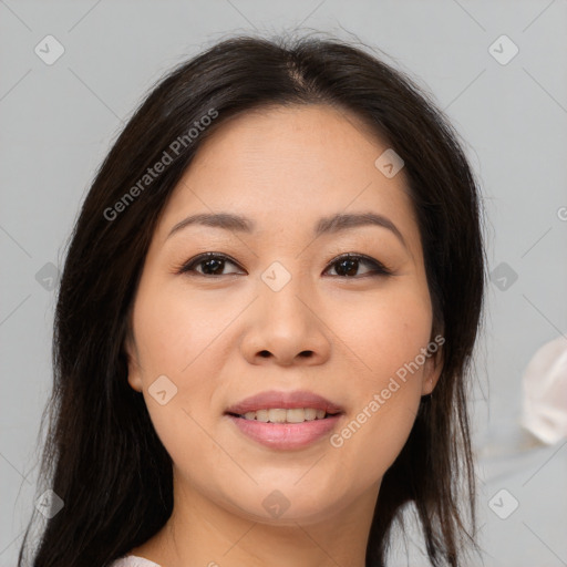 Joyful asian young-adult female with long  brown hair and brown eyes