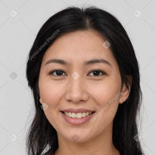 Joyful asian young-adult female with long  brown hair and brown eyes