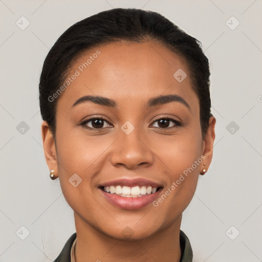 Joyful latino young-adult female with short  brown hair and brown eyes