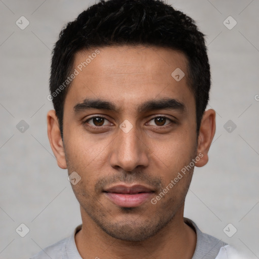 Neutral latino young-adult male with short  black hair and brown eyes