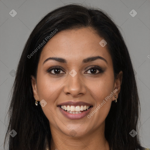 Joyful latino young-adult female with long  brown hair and brown eyes