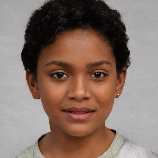 Joyful black child female with short  black hair and brown eyes