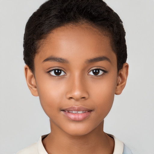 Joyful latino child female with short  brown hair and brown eyes