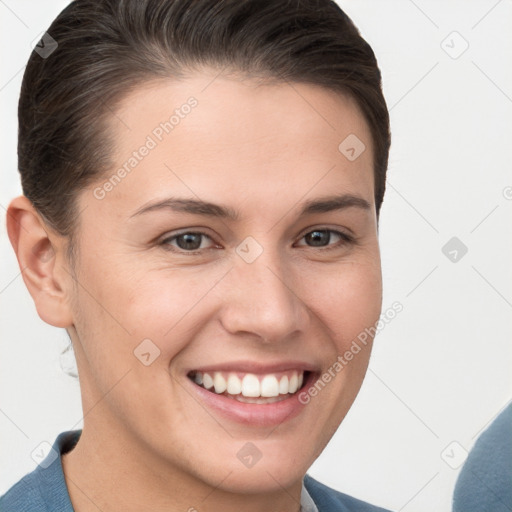 Joyful white young-adult female with short  brown hair and brown eyes