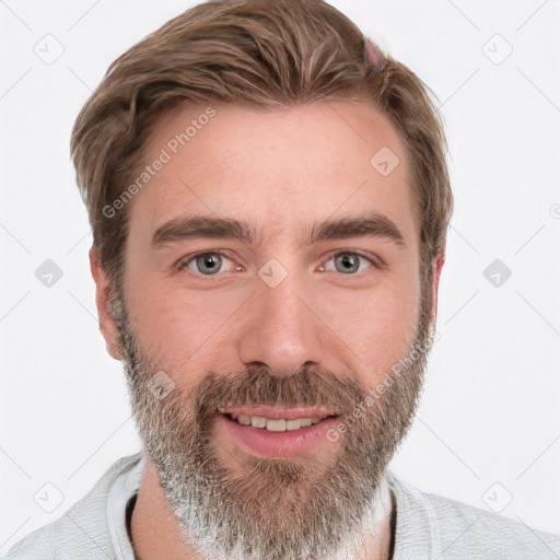 Joyful white adult male with short  brown hair and grey eyes