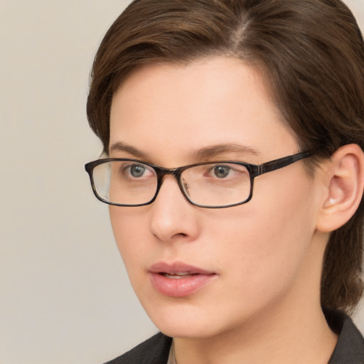 Neutral white young-adult female with medium  brown hair and brown eyes