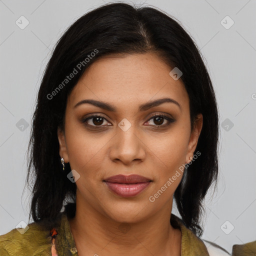 Joyful black young-adult female with medium  brown hair and brown eyes