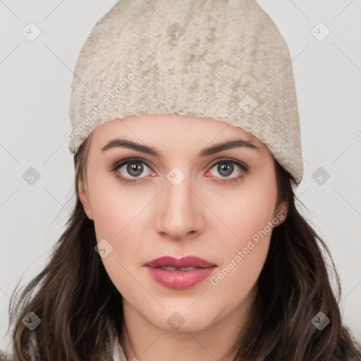 Joyful white young-adult female with long  black hair and brown eyes