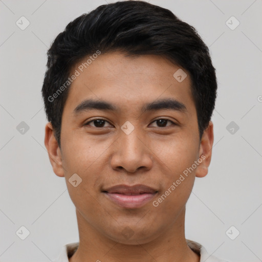 Joyful latino young-adult male with short  black hair and brown eyes