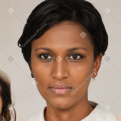 Neutral black young-adult female with medium  brown hair and brown eyes