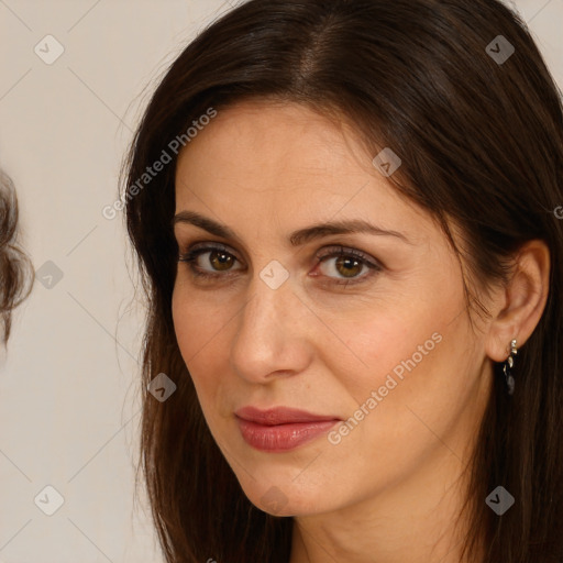 Joyful white adult female with medium  brown hair and brown eyes