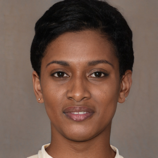Joyful latino young-adult female with short  black hair and brown eyes