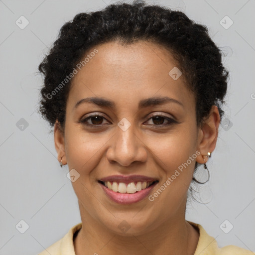 Joyful latino young-adult female with short  brown hair and brown eyes