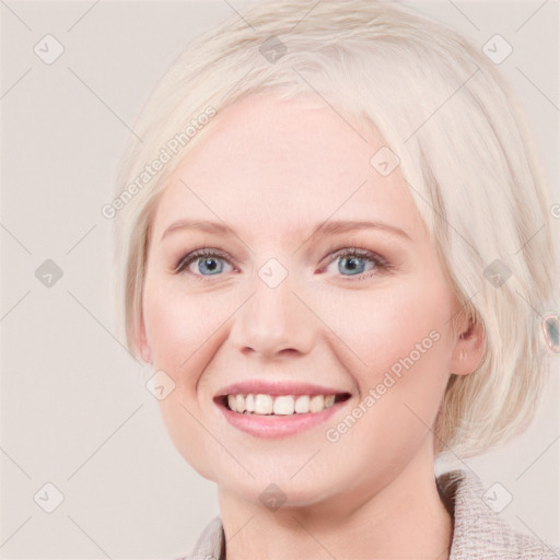 Joyful white young-adult female with medium  blond hair and blue eyes