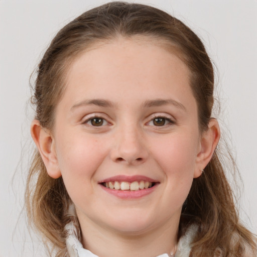 Joyful white child female with medium  brown hair and grey eyes