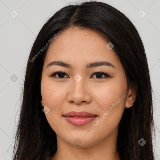 Joyful latino young-adult female with long  brown hair and brown eyes