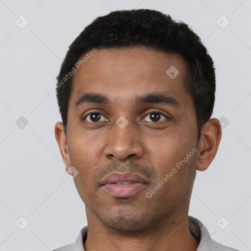 Neutral black young-adult male with short  black hair and brown eyes