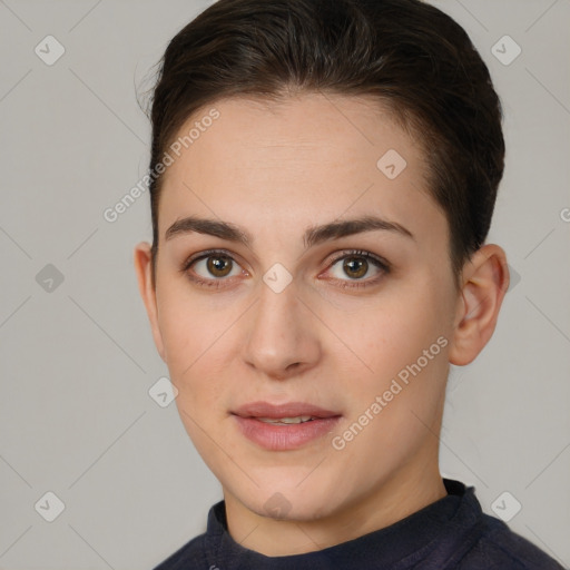 Joyful white young-adult female with short  brown hair and brown eyes