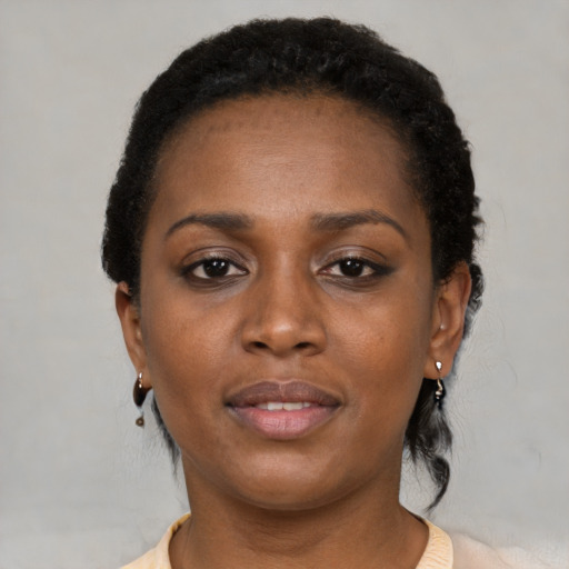 Neutral black young-adult female with short  black hair and brown eyes