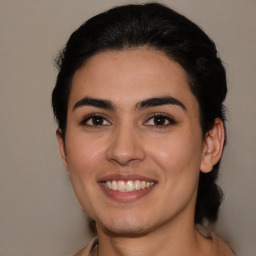 Joyful latino young-adult female with medium  brown hair and brown eyes