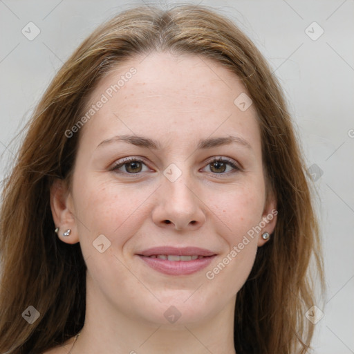 Joyful white young-adult female with long  brown hair and grey eyes