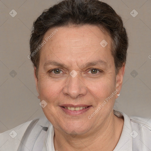 Joyful white adult female with short  brown hair and brown eyes