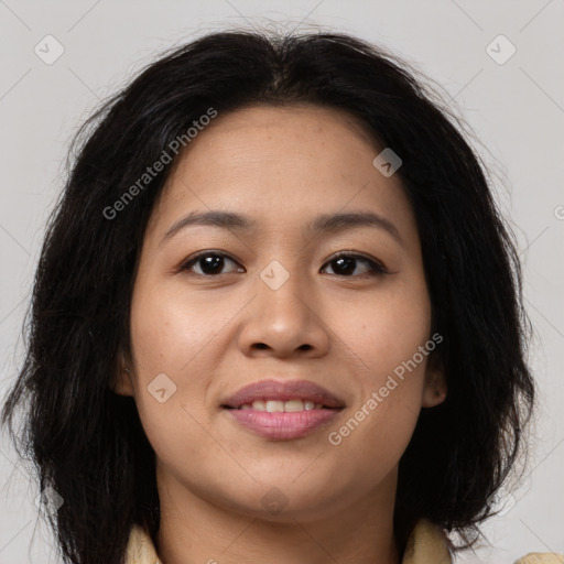 Joyful asian young-adult female with medium  brown hair and brown eyes