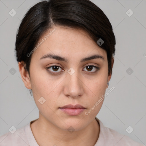 Neutral white young-adult female with short  brown hair and brown eyes