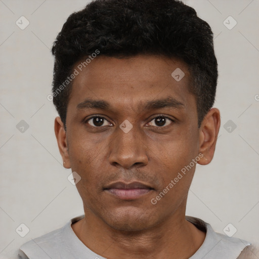 Neutral black young-adult male with short  black hair and brown eyes