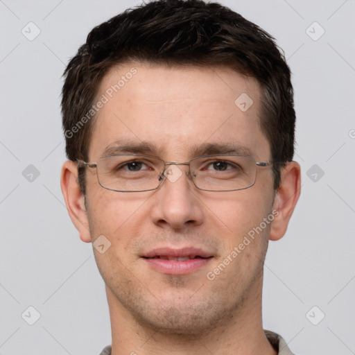 Joyful white young-adult male with short  brown hair and brown eyes