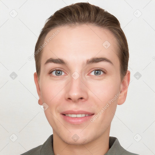 Joyful white young-adult female with short  brown hair and grey eyes