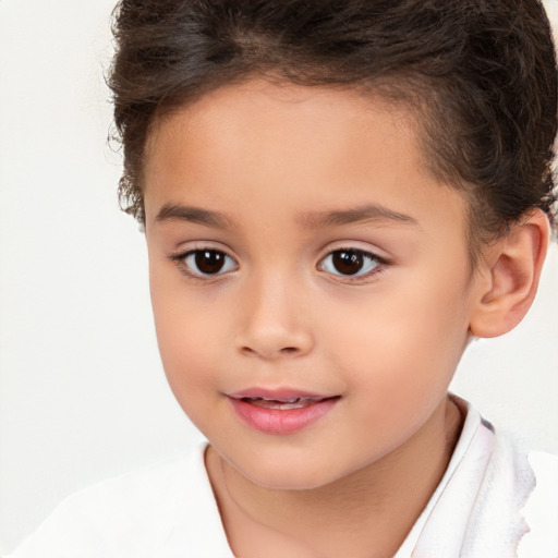 Joyful white child female with short  brown hair and brown eyes