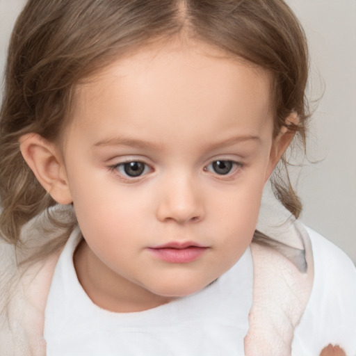 Neutral white child female with medium  brown hair and brown eyes