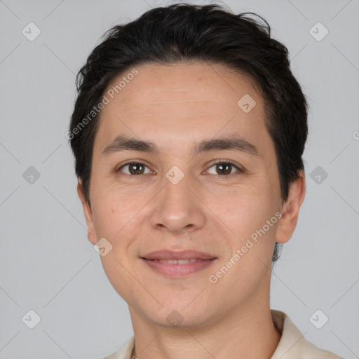 Joyful white adult male with short  brown hair and brown eyes