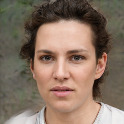 Neutral white young-adult female with short  brown hair and brown eyes