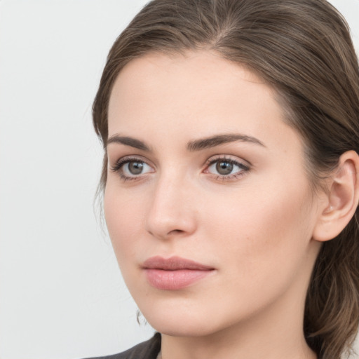 Neutral white young-adult female with medium  brown hair and grey eyes