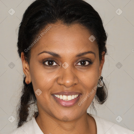 Joyful latino young-adult female with medium  brown hair and brown eyes