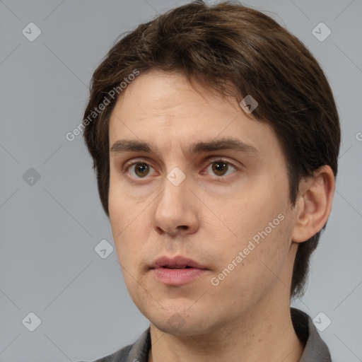 Neutral white adult male with medium  brown hair and brown eyes