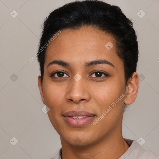 Joyful latino young-adult female with short  brown hair and brown eyes