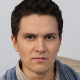 Neutral white adult male with short  brown hair and brown eyes