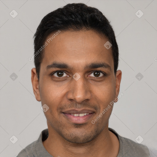 Joyful latino young-adult male with short  black hair and brown eyes