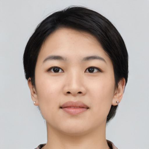 Neutral asian young-adult female with short  black hair and brown eyes